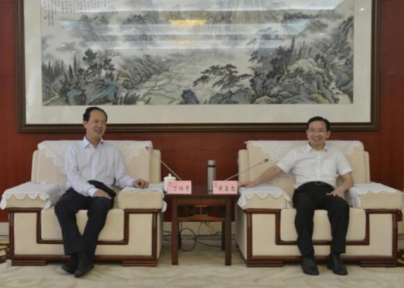 丁焰章拜會南昌市委副書記、市長黃喜忠